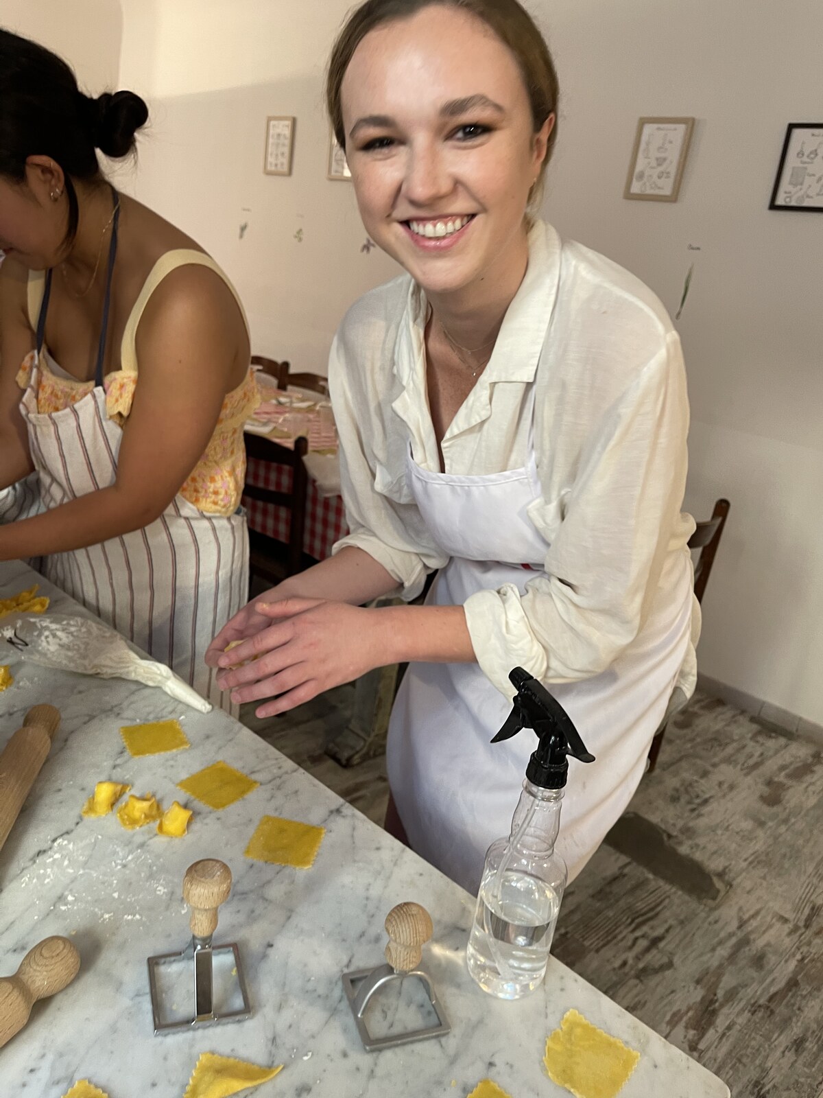 A leadership summit attendee winding down at a small Italian cooking class